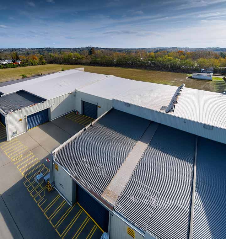 aerial view of top of warehouse, loading dock and garage doors